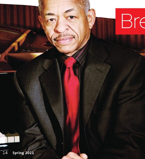 Adegoke Steve Colson seated at a piano, from the Chamber Music magazine feature, Spring 2021